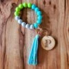 Silicone Bead Wristlet With Flower Initial | Bangle Key Ring With Suede Tassel | Bracelet Keychain | Custom Silicone Bangle Keyring
