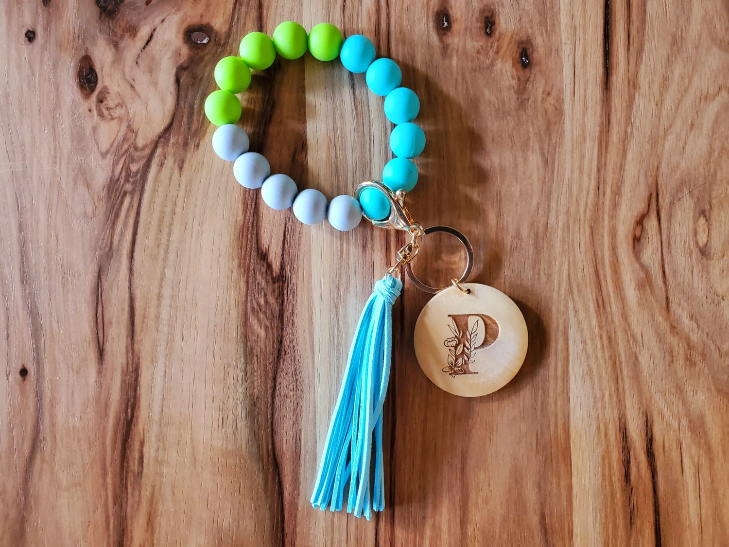 Silicone Bead Wristlet With Flower Initial | Bangle Key Ring With Suede Tassel | Bracelet Keychain | Custom Silicone Bangle Keyring 1 Silicone Bead Wristlet With Flower Initial | Bangle Key Ring With Suede Tassel | Bracelet Keychain | Custom Silicone Bangle Keyring