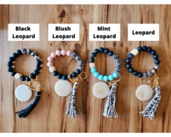 Silicone Bead Wristlet With Flower Initial | Bangle Key Ring With Suede Tassel | Bracelet Keychain | Custom Silicone Bangle Keyring 11 Silicone Bead Wristlet With Flower Initial | Bangle Key Ring With Suede Tassel | Bracelet Keychain | Custom Silicone Bangle Keyring -The Farmer’s Wife WI Deals Store LeopardBracelets 1